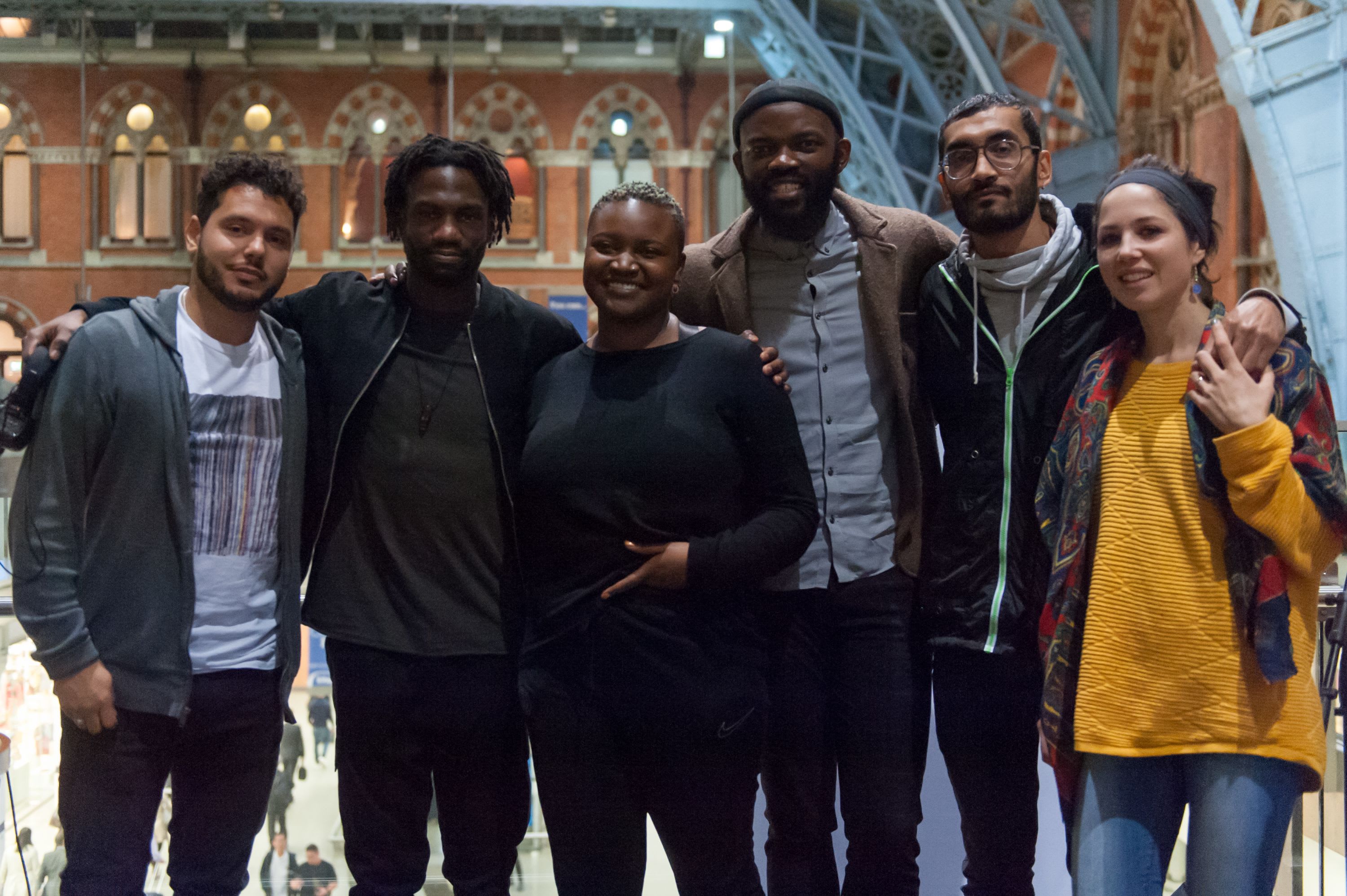 Belinda Zhawi, Jolade Olusanya, JJ Bola, Kareem Samara, Emily Zaara and Basel Zaara at St Pancras station